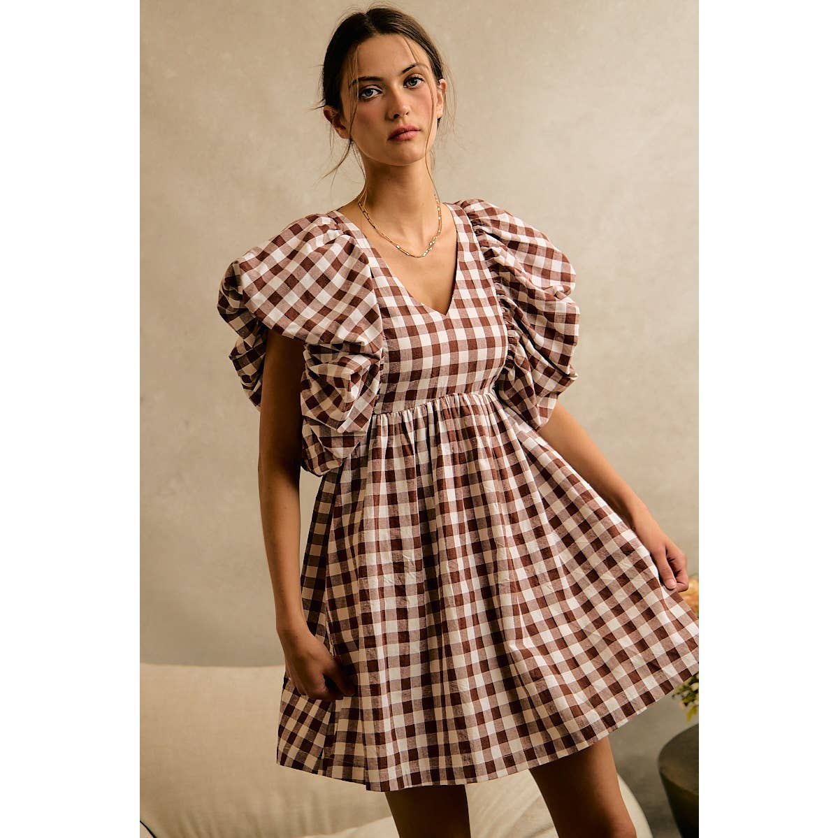 GINGHAM BUBBLE SMOCKED DRESS: BROWN